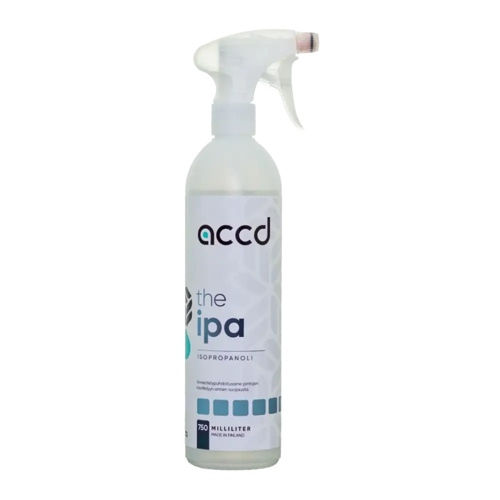 A clear plastic spray bottle with white trigger nozzle labeled accd ipa isopropanol 750ml for pintojen valmisteluun
