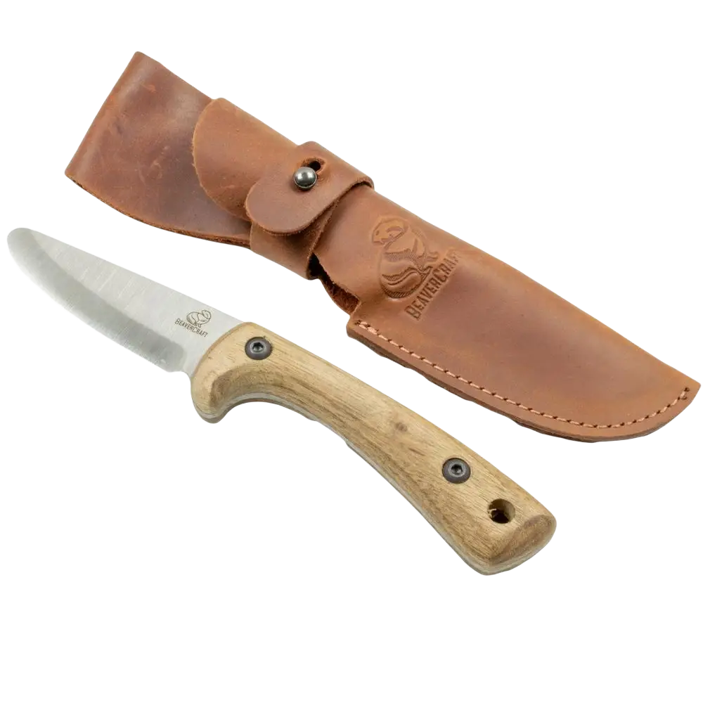 A sleek silver blade with light wood handle and two rivets beside its tan leather sheath in beavercraft eräpuukko junior