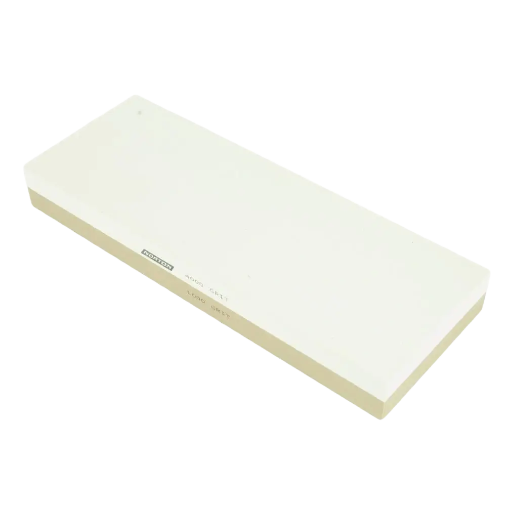Cream-colored vesihiomakivi norton 1000 4000 whetstone with smooth flat surface and rounded edges for sharpening